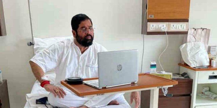 Eknath Shinde takes review of mumbais corona situation from the hospital