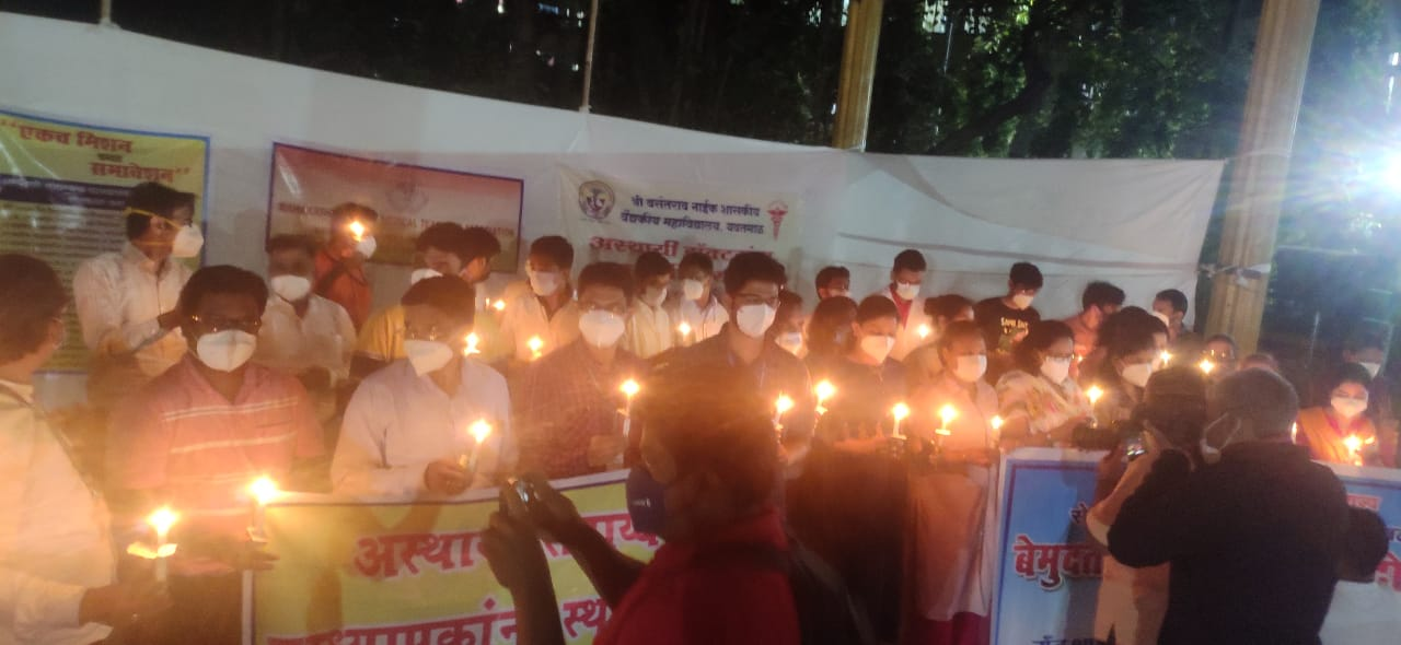 Candle march of 200 assistant professors outside JJ Hospital