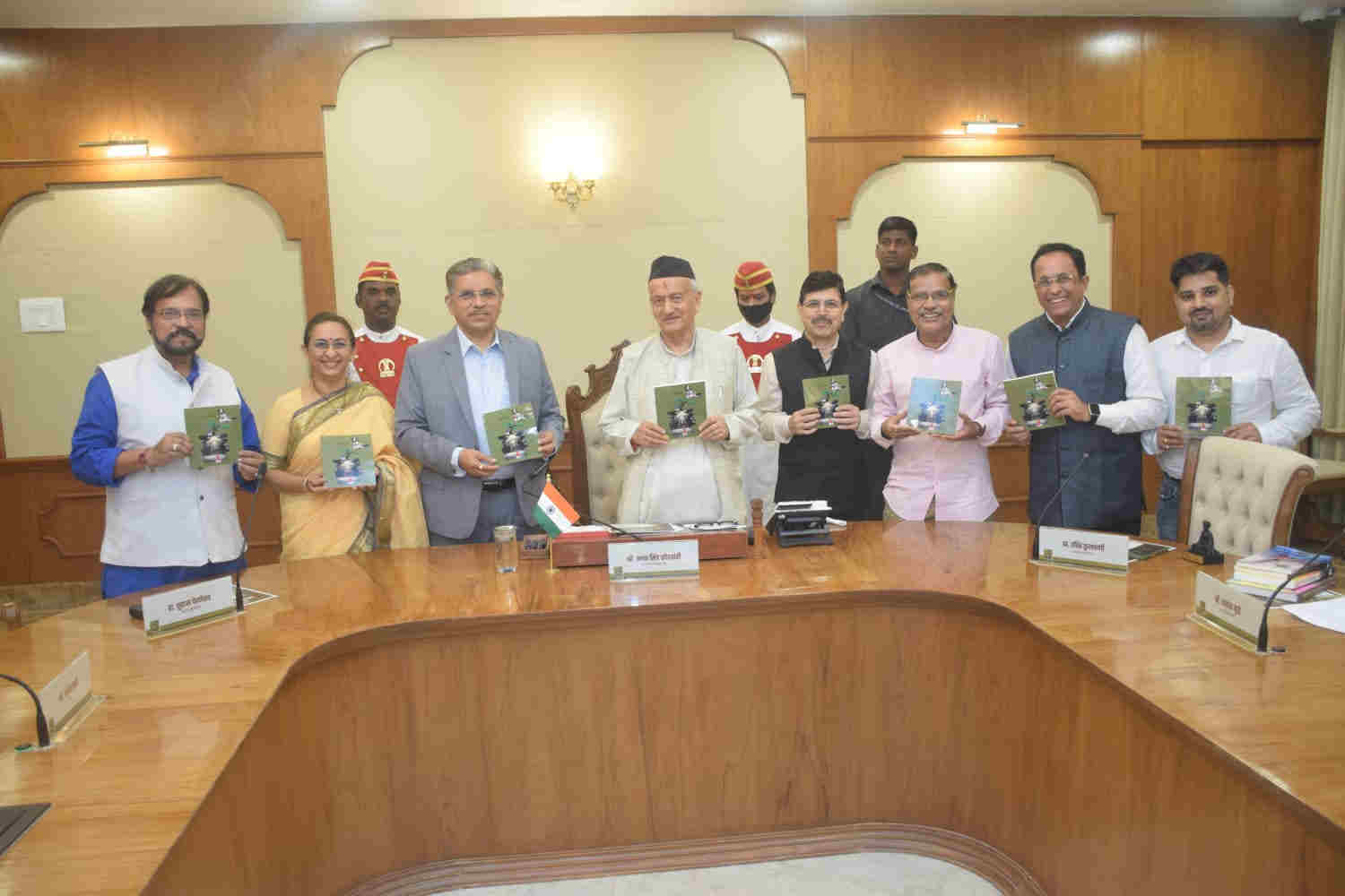 Maharashtra Governor releases poetry book by MU VC Suhas Pednekar 2